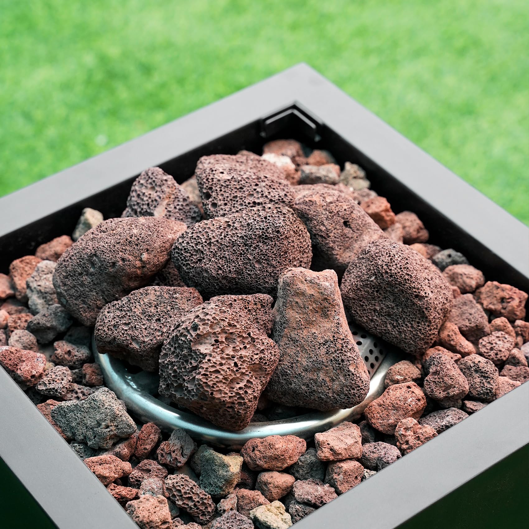 Mr. Fireglass lava rocks in a pond setup showing porous media supporting water feature health