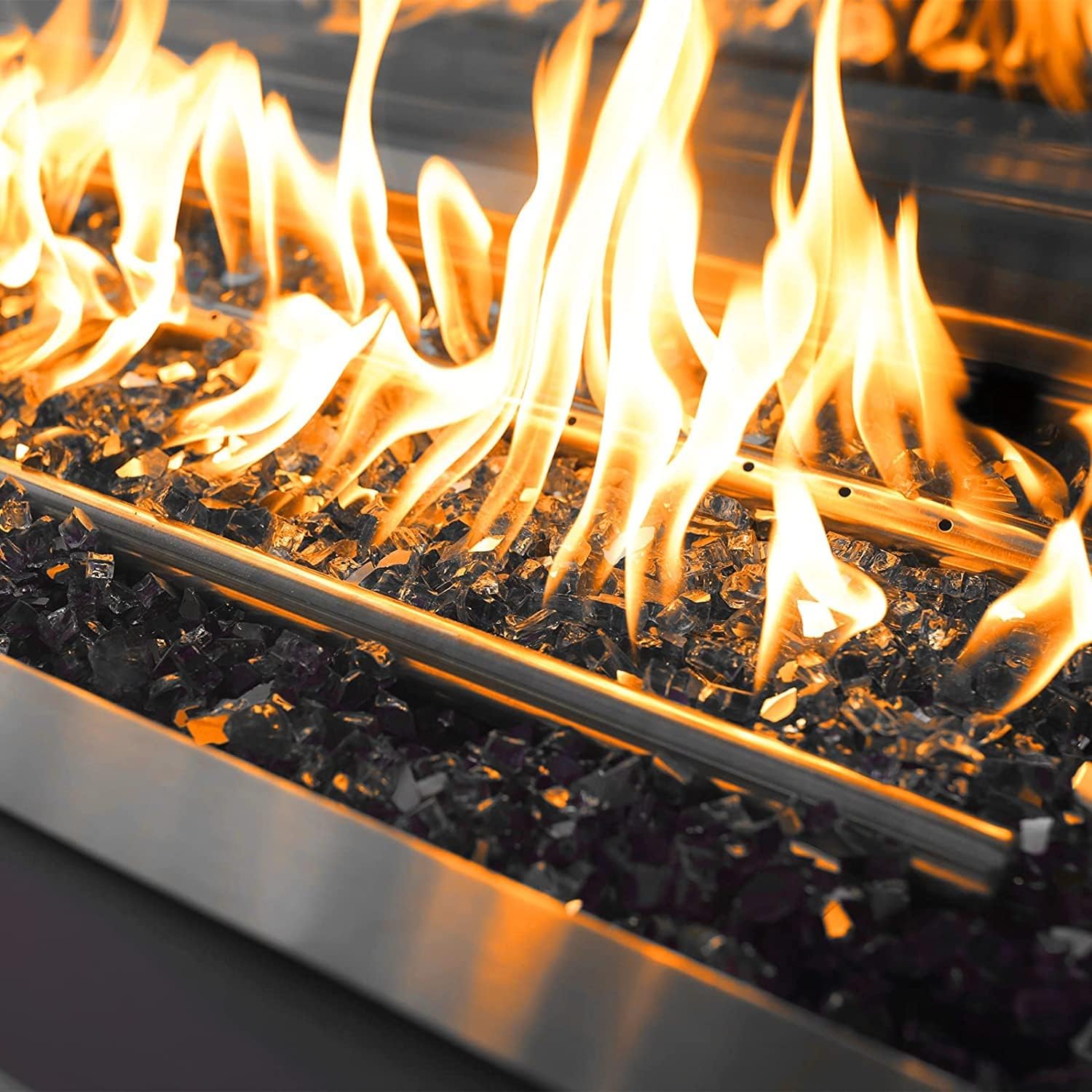 Mr. Fireglass being rinsed with vinegar solution for low-maintenance cleaning