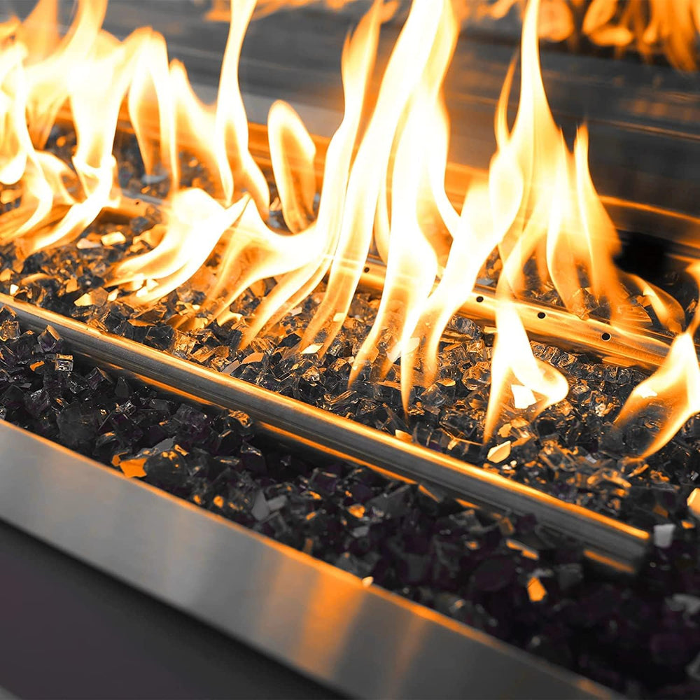 Mr. Fireglass being rinsed with vinegar solution for low-maintenance cleaning