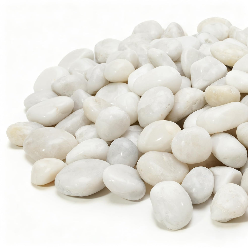 Mr. Fireglass pebbles under running water demonstrating easy rinsing before use