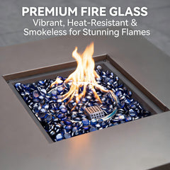Outdoor fire pit filled with Mr. Fireglass cobalt blue beads producing jewel-like glow