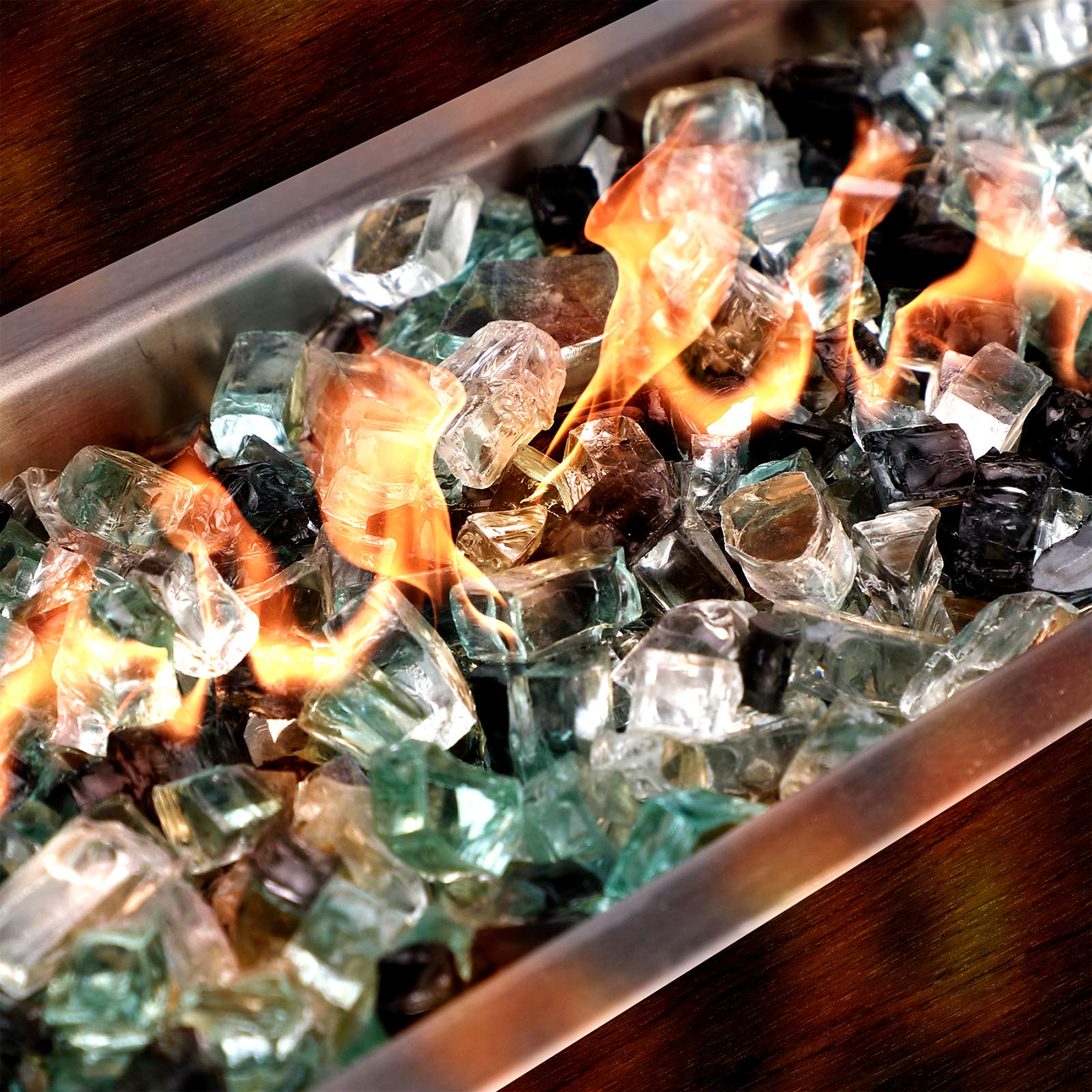 Mr. Fireglass in fire pit with flames showing enhanced sparkle and clean burning benefit
