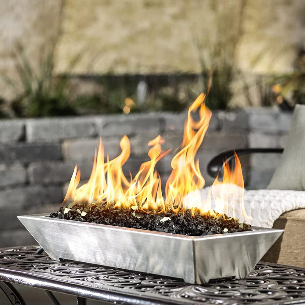 Mr. Fireglass in firepit with flames showing multicolored sparkle