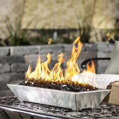 Mr. Fireglass in firepit with flames showing multicolored sparkle