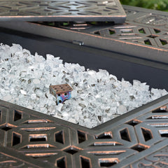 Mr. Fireglass in a firepit at night showing bright flame reflection and dramatic glow