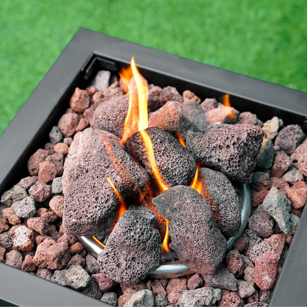 Mr. Fireglass granules installed in a gas fire pit showing steadier flames and decorative finish