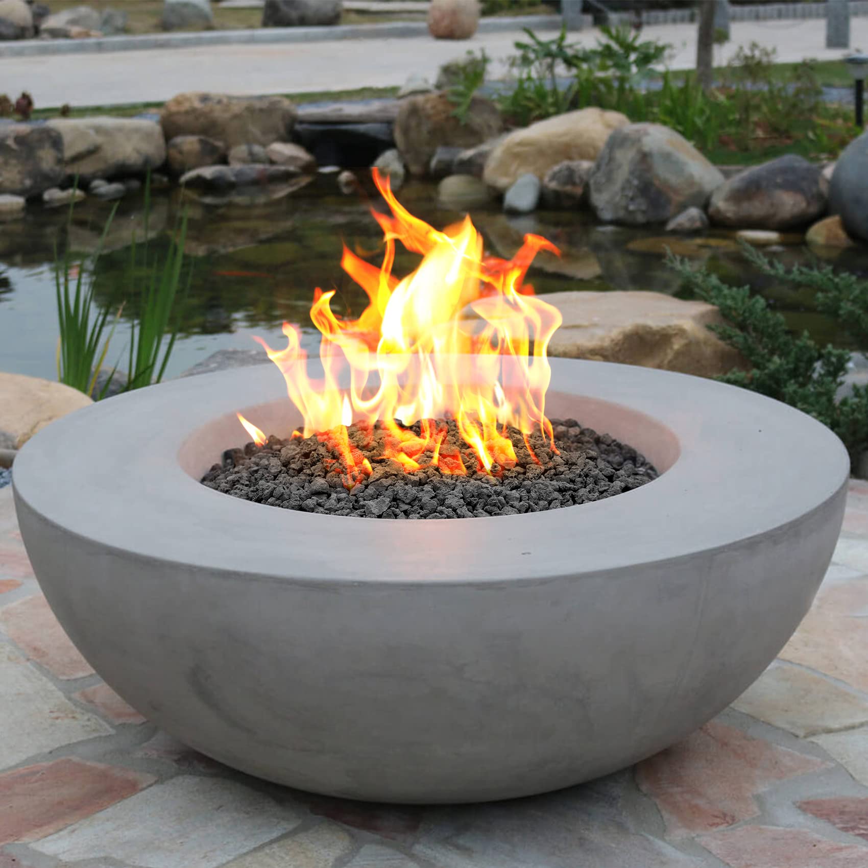 Mr. Fireglass lava rock used in garden bed offering moisture retention benefit