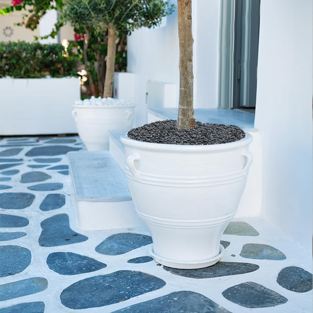 Mr. Fireglass pebbles installed as pathway edging for tidy landscape definition