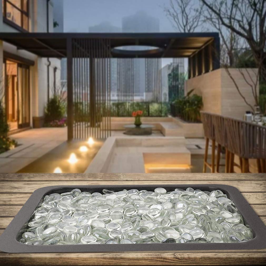 Mr. Fireglass filling a tabletop vase for modern indoor decor appeal