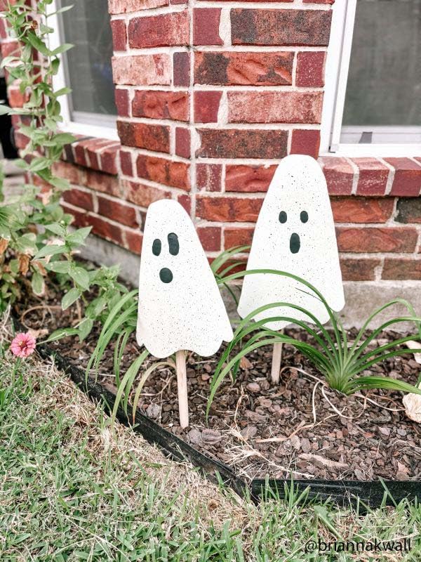 Mud Pie staked in garden bed showing easy push-in setup and visibility