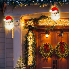 Mudder Santa installed on porch light providing seasonal outdoor cheer