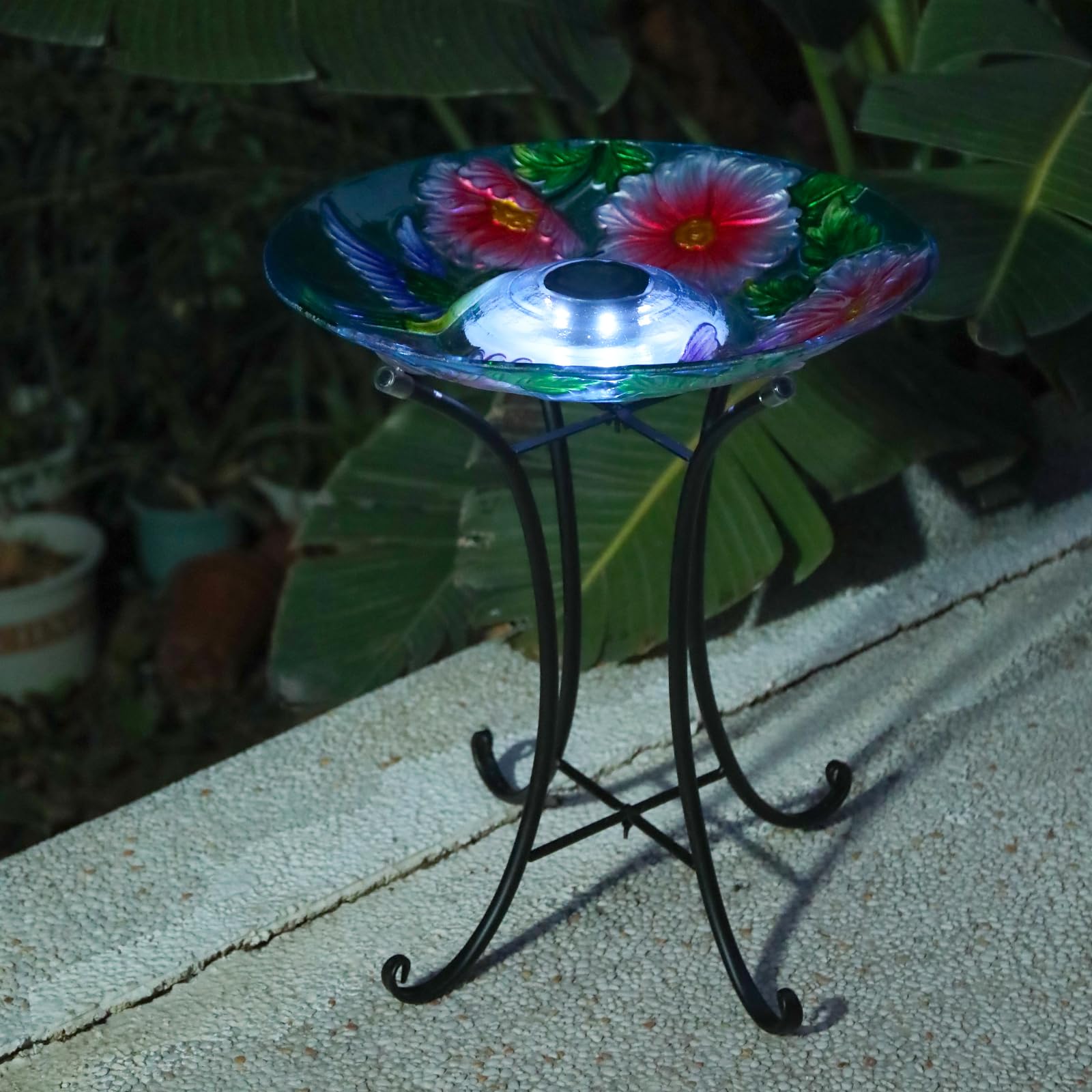 MUMTOP bird bath glowing on patio at night creating ambient light and evening appeal