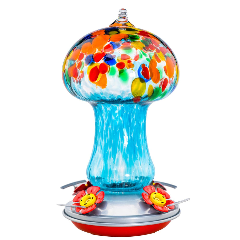 Muse Garden front view showing colorful blown-glass feeder attracting birds