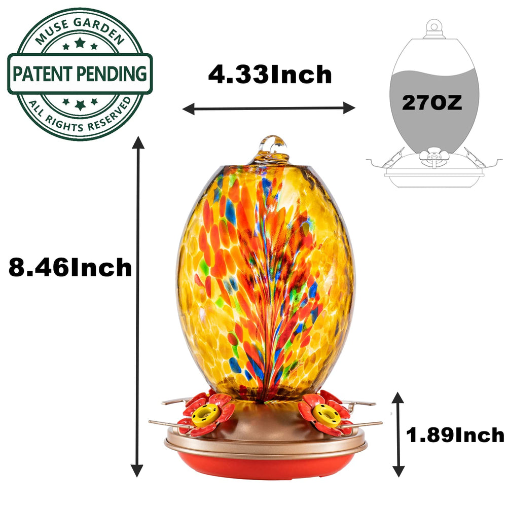Muse Garden feeder held in hand to show 27oz scale and easy handling for refills