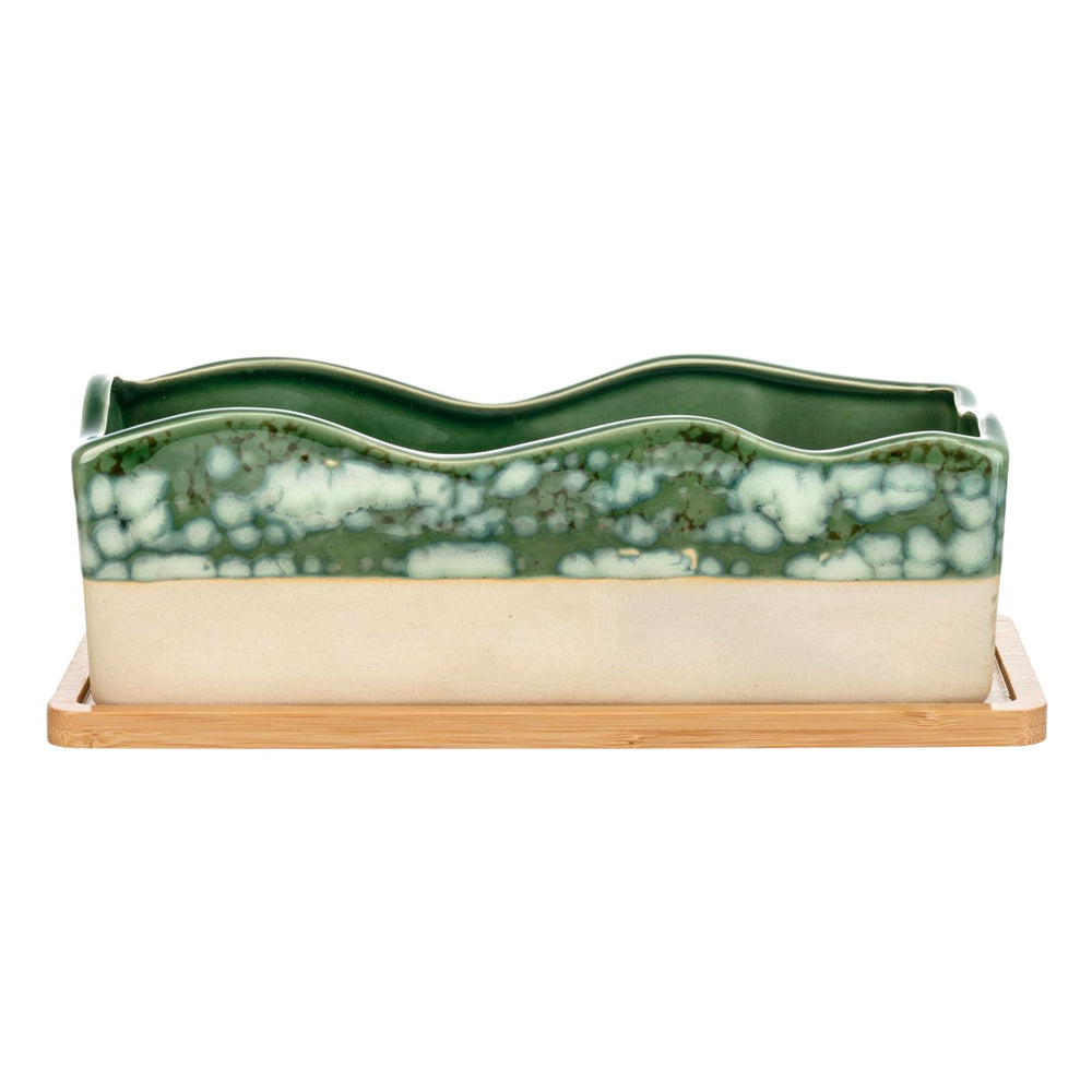 MyGift shown held in hand to show scale and suitability for desks and counters