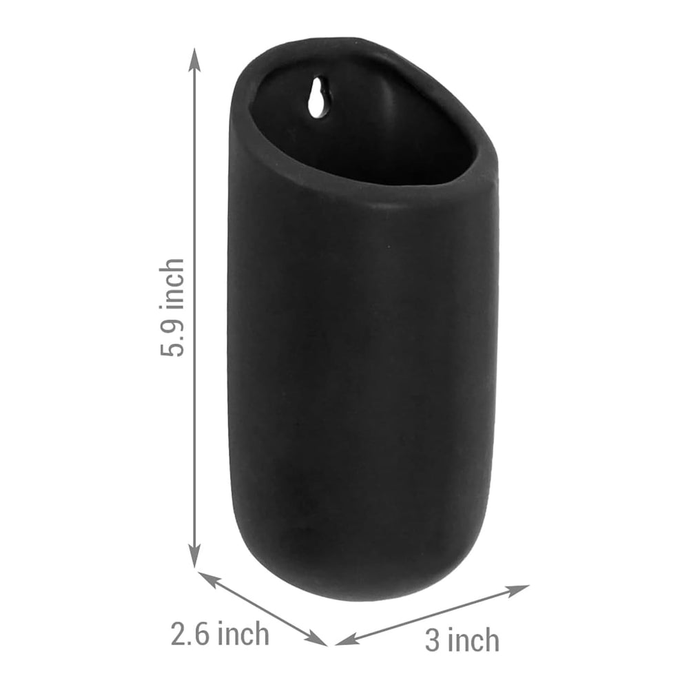 MyGift planters next to a hand for scale to show compact size and installation ease