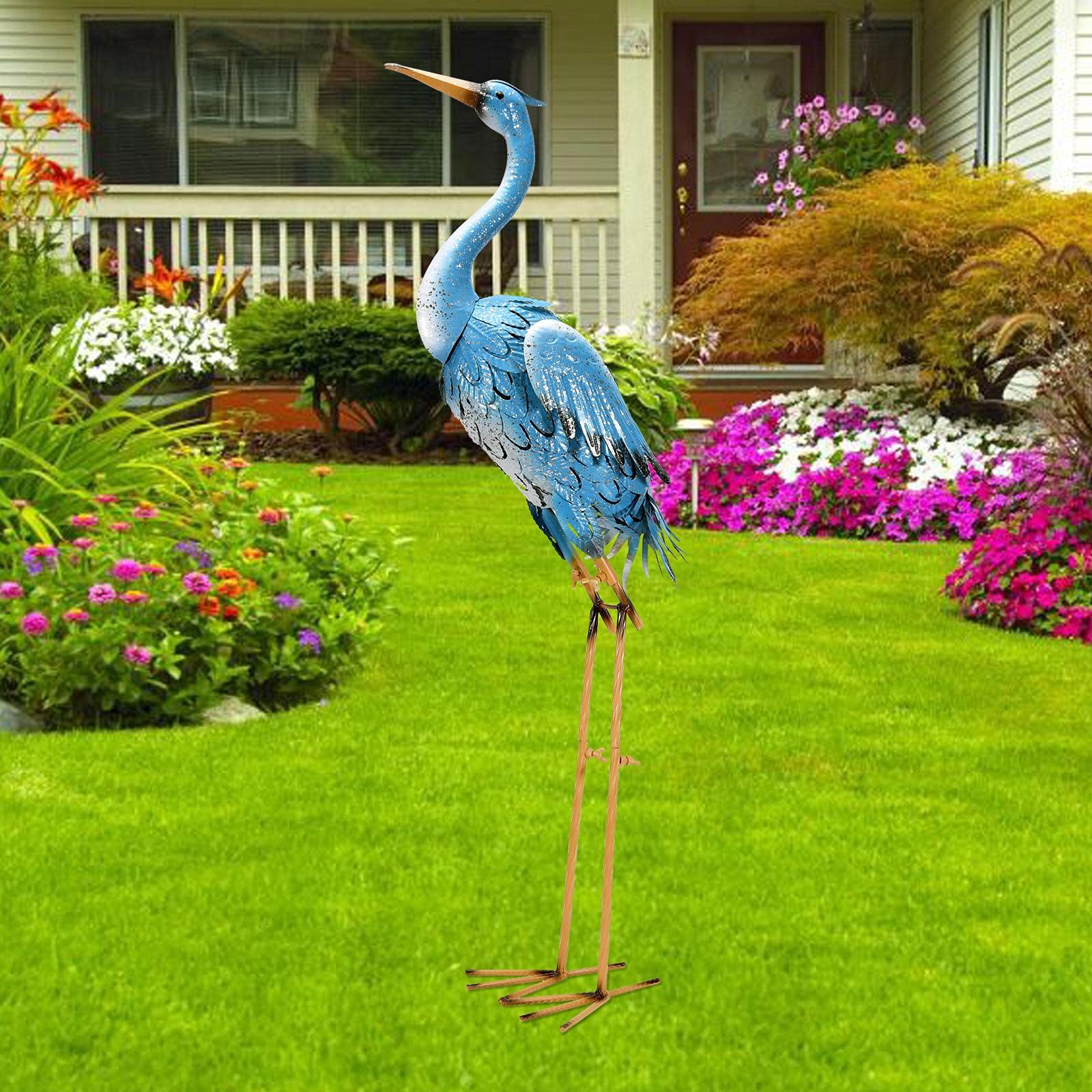 Nacome blue metal crane front view showing elegant silhouette and garden appeal