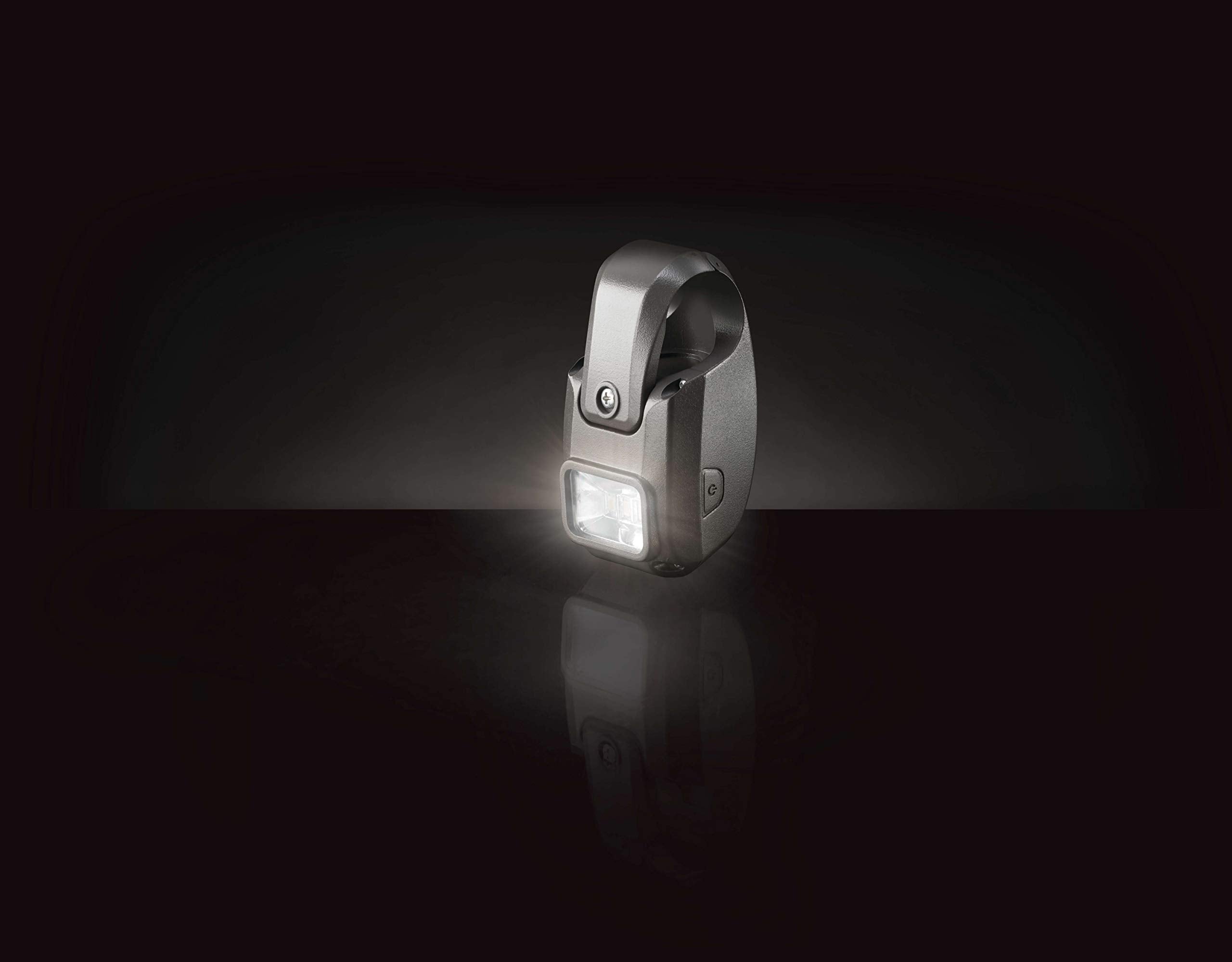 Napoleon light in use over night grill showing improved visibility benefit