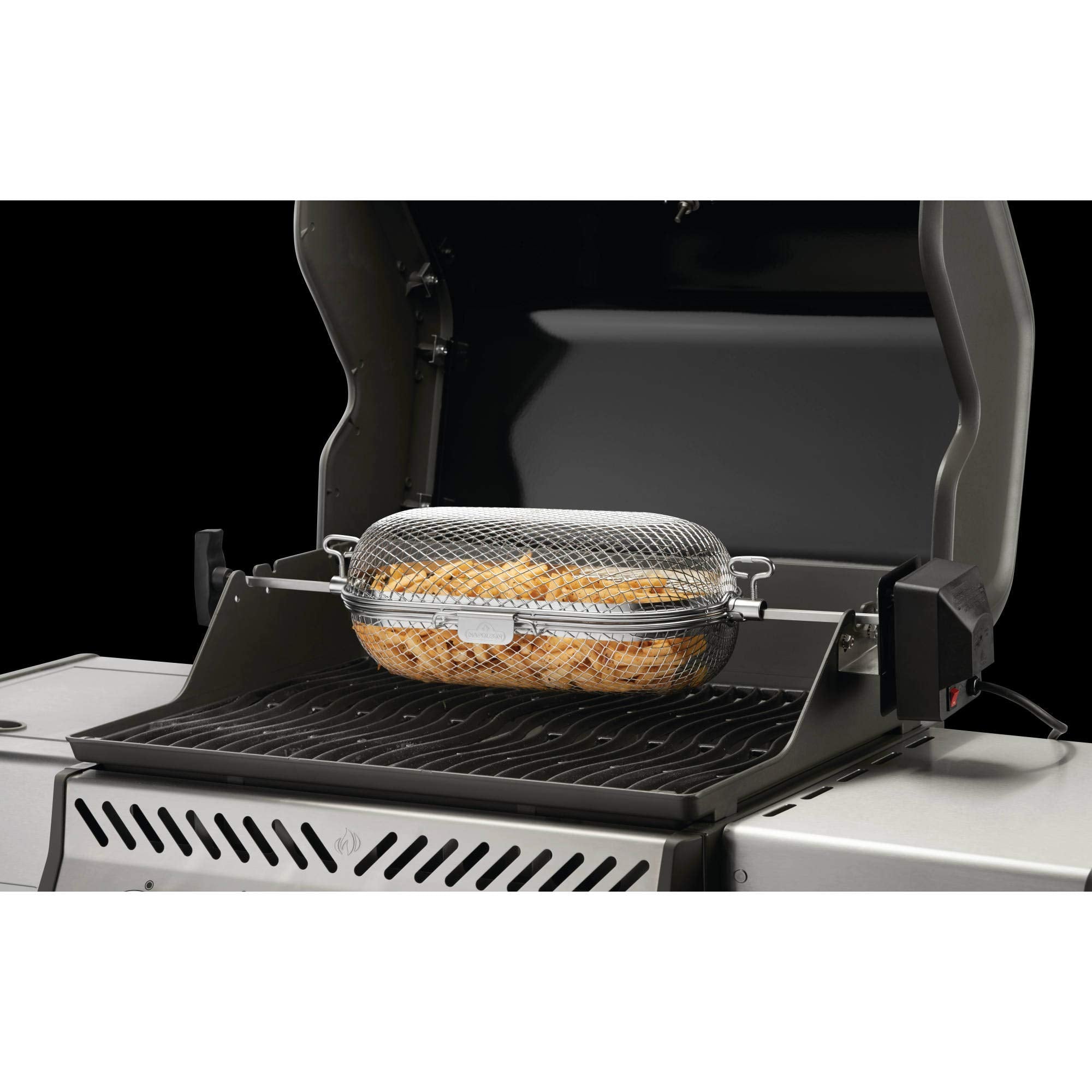 Napoleon rotisserie basket mounted on spit rod demonstrating compatibility