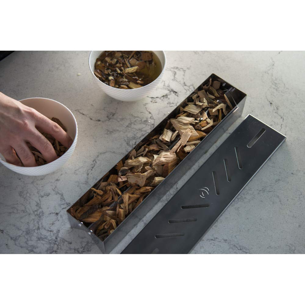 Napoleon smoker box next to ruler showing 16.25-inch length for scale benefit