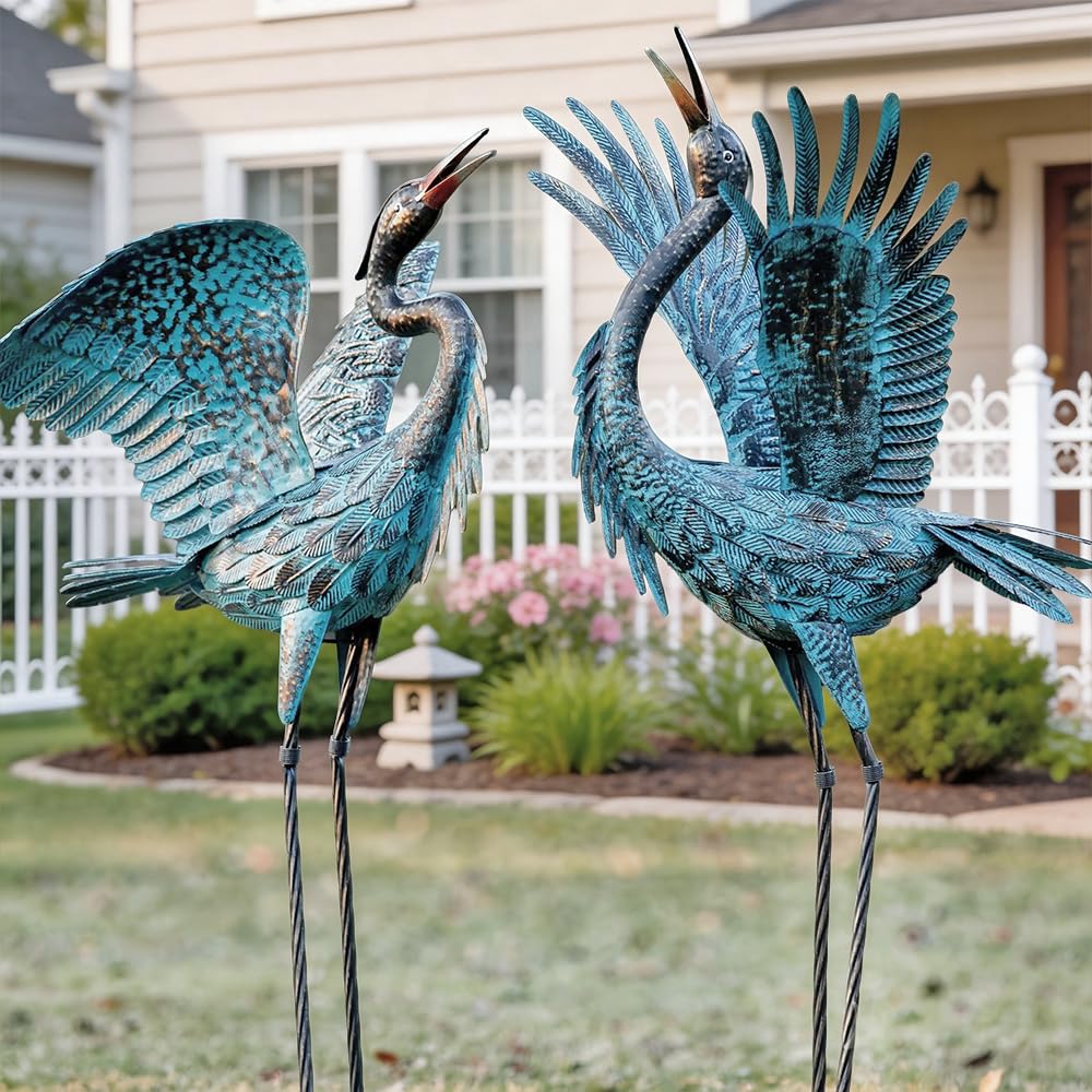 Natelf pair by pond lifestyle shot adding graceful ambiance to water edge