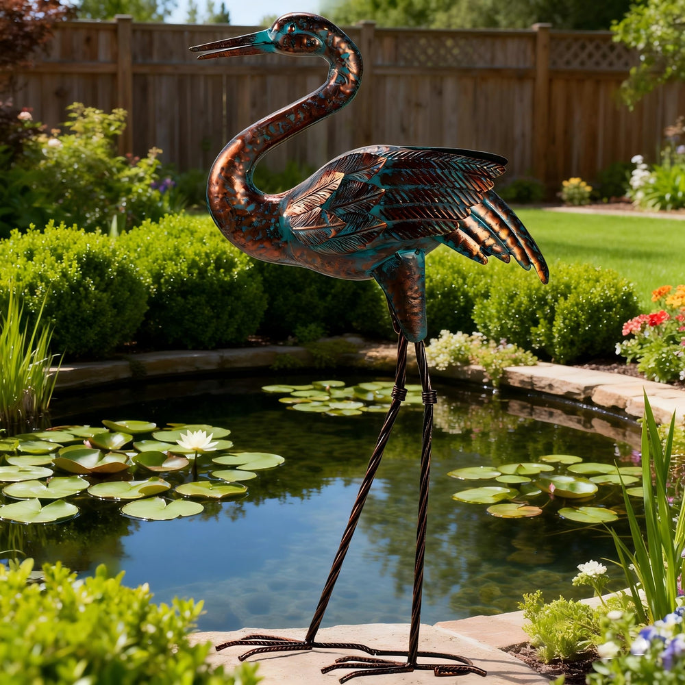 Natelf front view of metal crane statue showing elegant posture and garden appeal