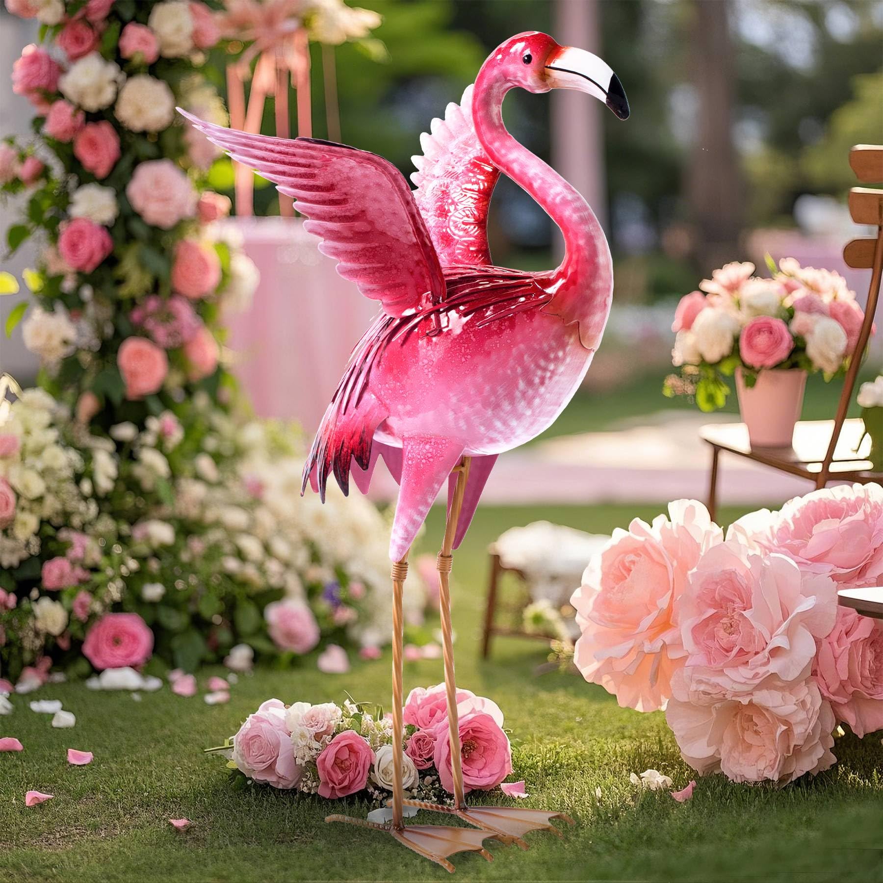Natelf flamingo placed in planter border adding colorful focal point