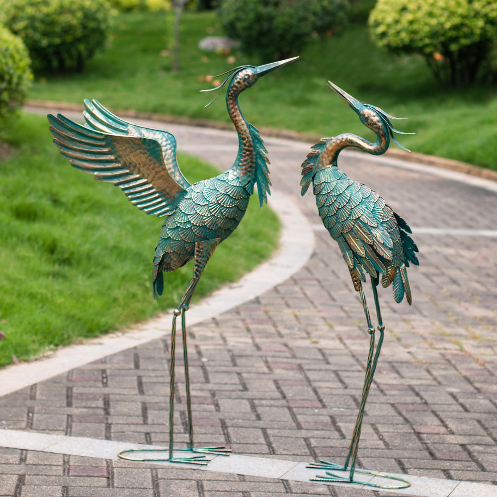 Natelf garden pair in flowerbed showing layered composition and charm