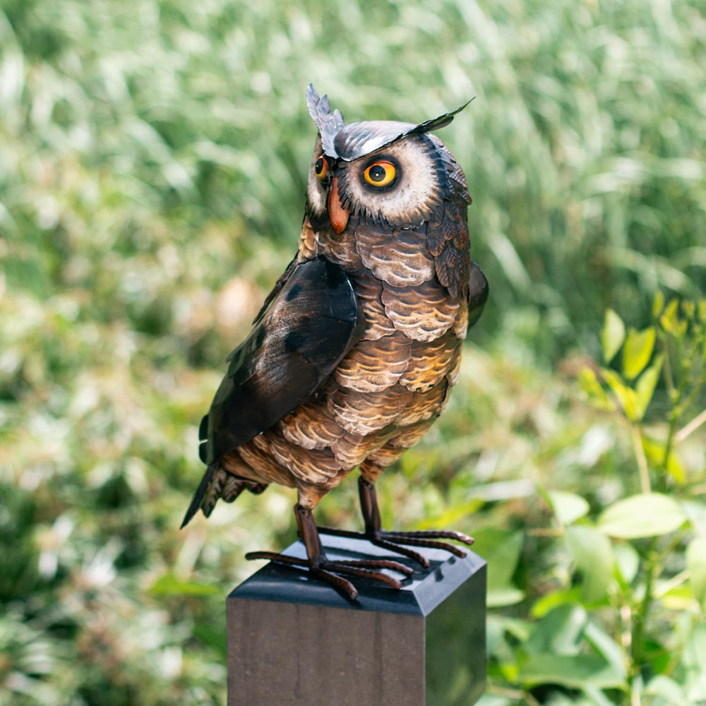Natelf owl on patio table lifestyle scene adding charm to outdoor seating area