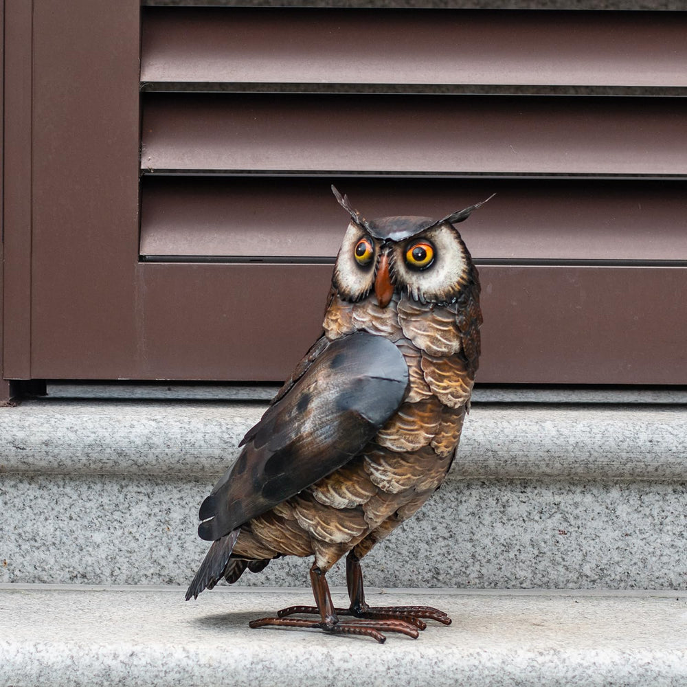 Natelf owl in rain showing weather-resistant finish for lasting outdoor durability