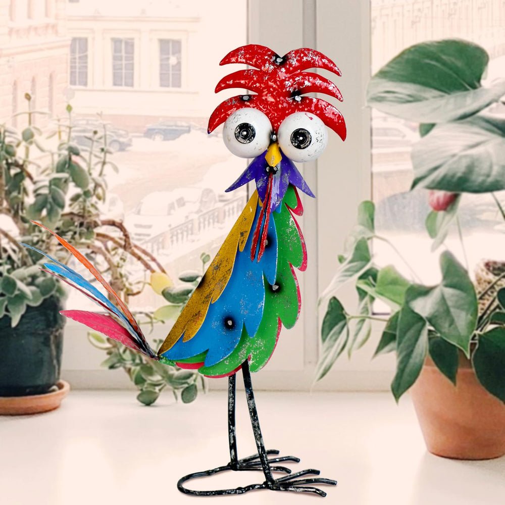 Natelf rooster placed among flowers adding contrast and a playful focal point