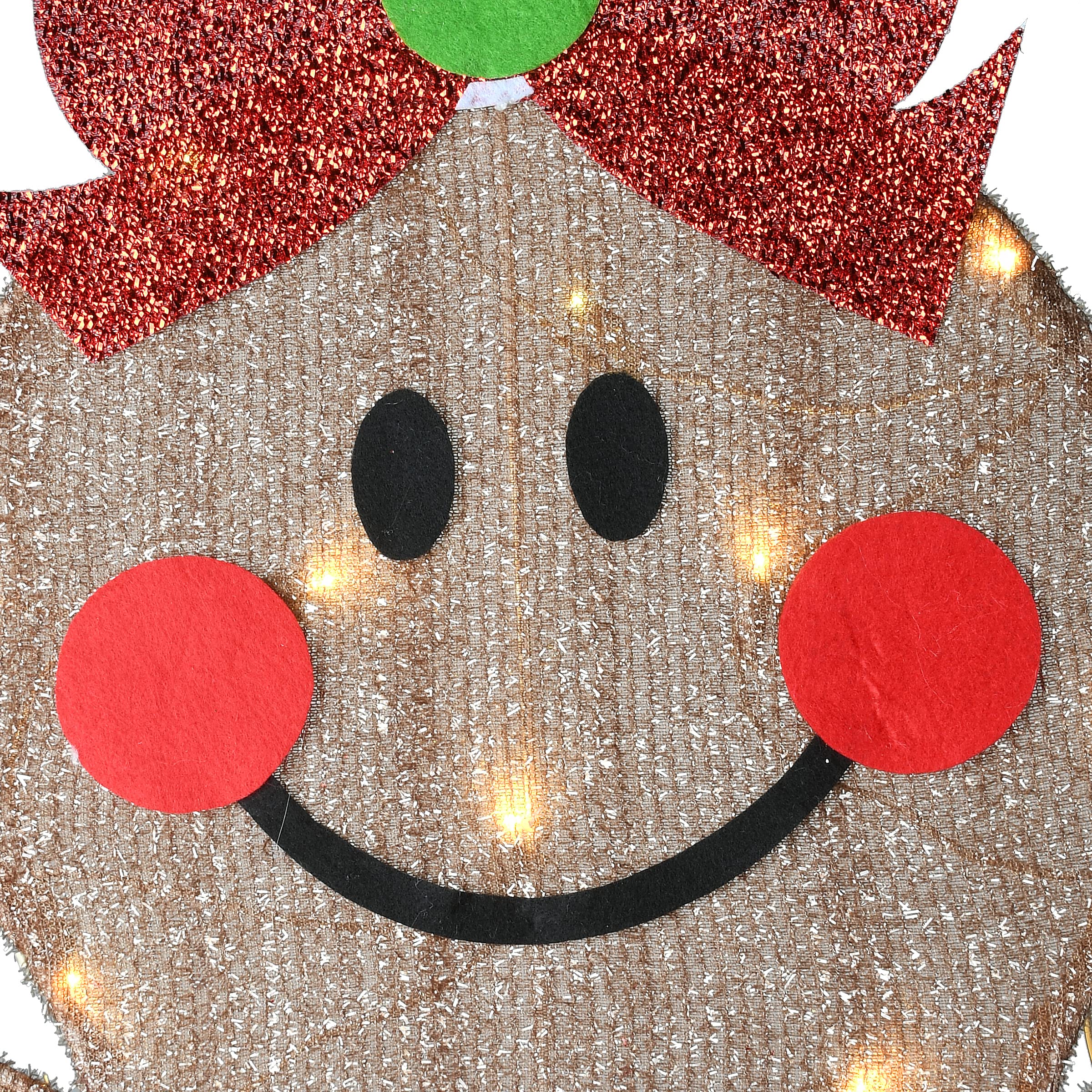 National Tree Company gingerbread couple staged on porch showing welcoming holiday decoration benefit