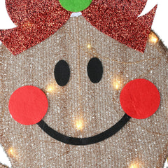 National Tree Company gingerbread couple staged on porch showing welcoming holiday decoration benefit