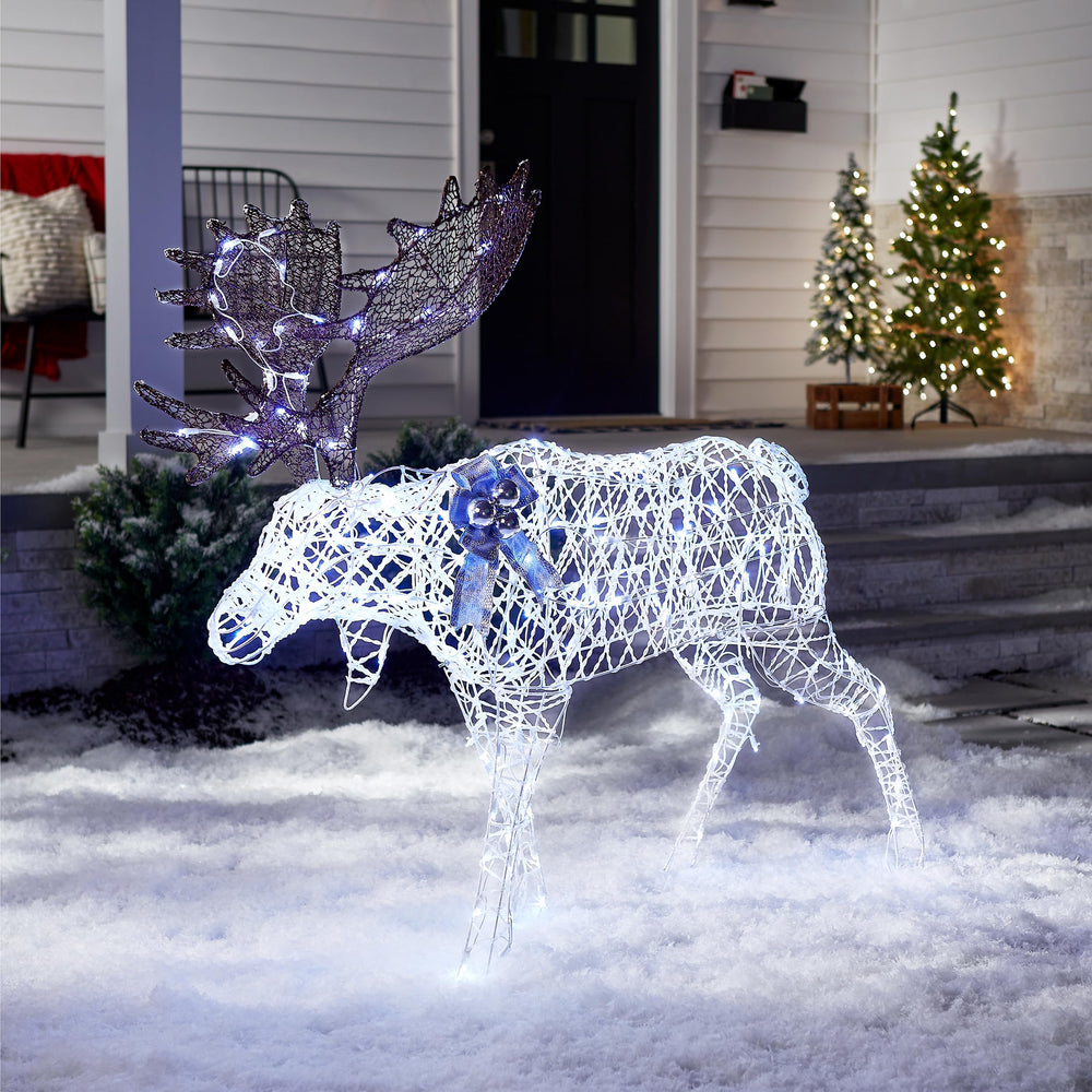National Tree Company moose lit on a lawn at night, highlights bright cool white LEDs