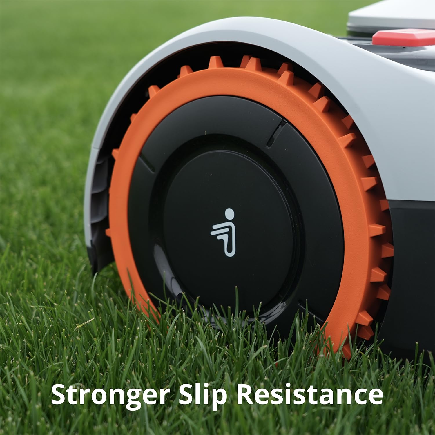 NAVIMOW wheel beside ruler showing 248mm diameter for improved rollover ability