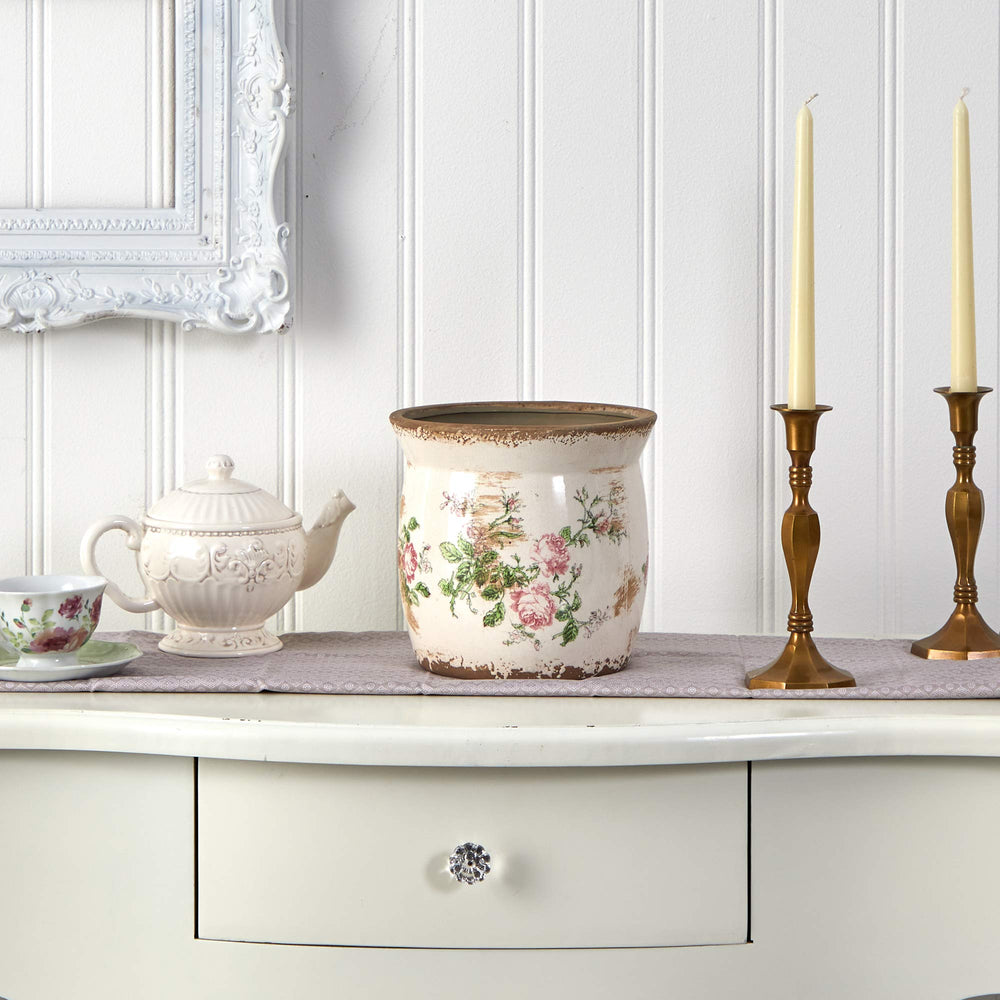 Nearly Natural planter styled with faux flowers on table creating cozy decor