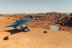 Neso anchor bags filled with sand showing secure setup and wind resistance