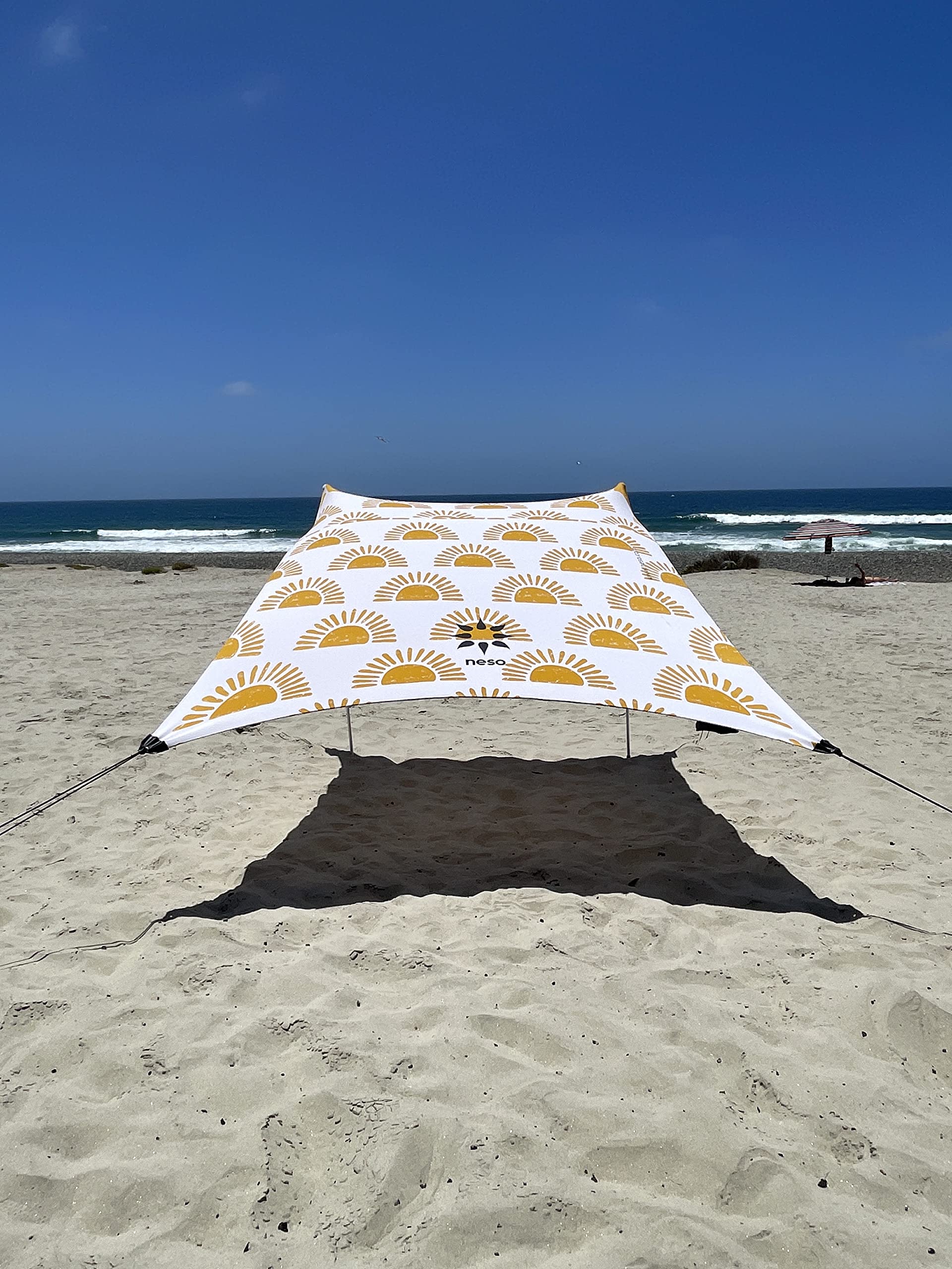 Neso front view canopy showing roomy shade and quick shelter benefit