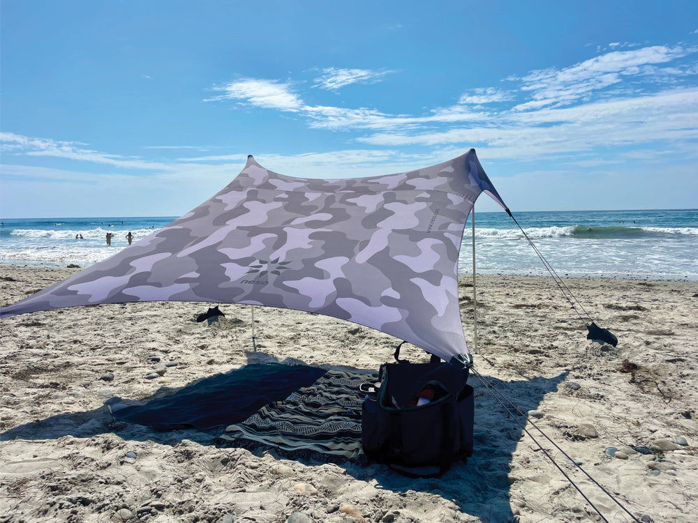Neso front view grey camo tent showing full shelter and shade benefit