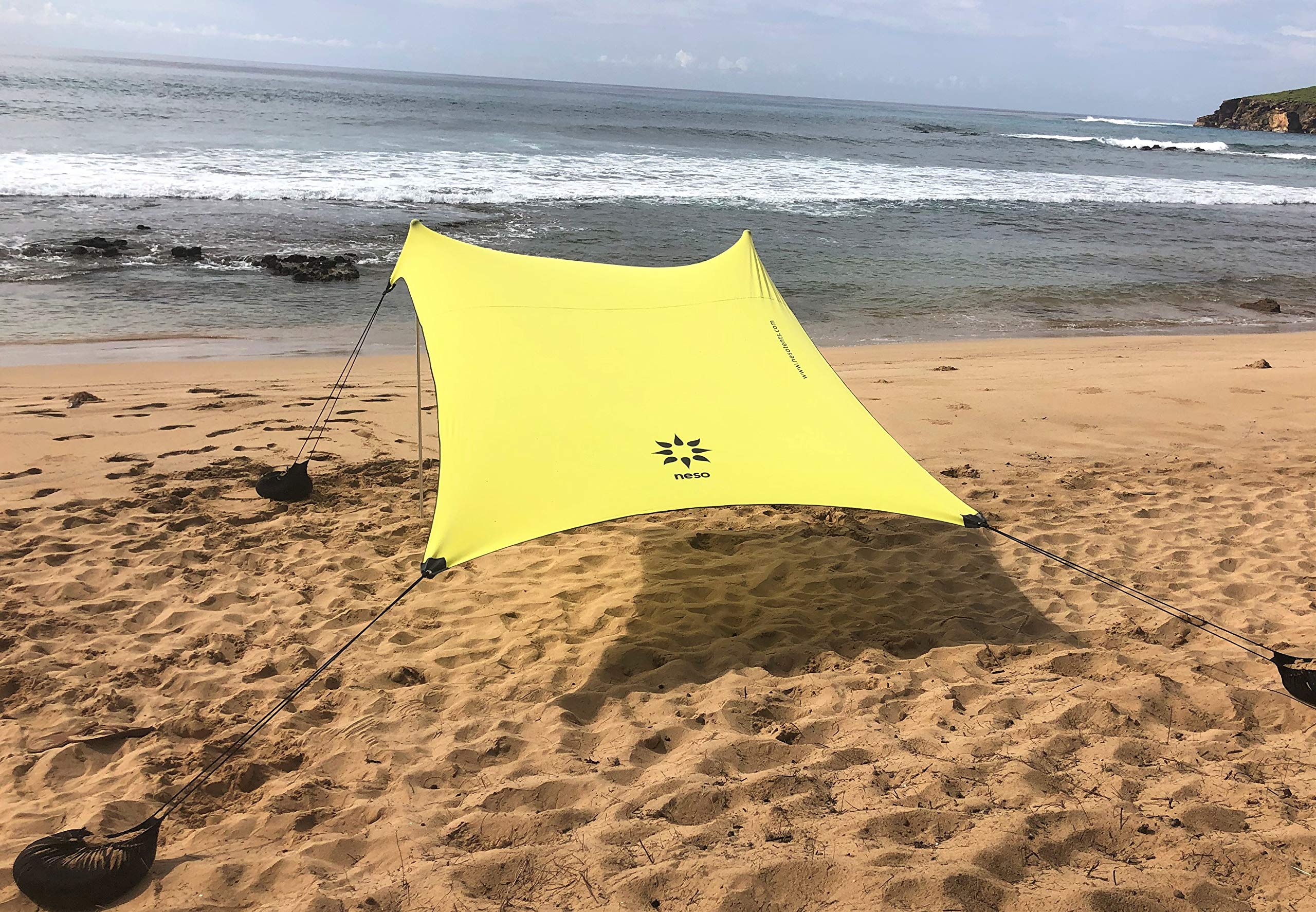 Neso front view lemon canopy showing full shade and compact footprint