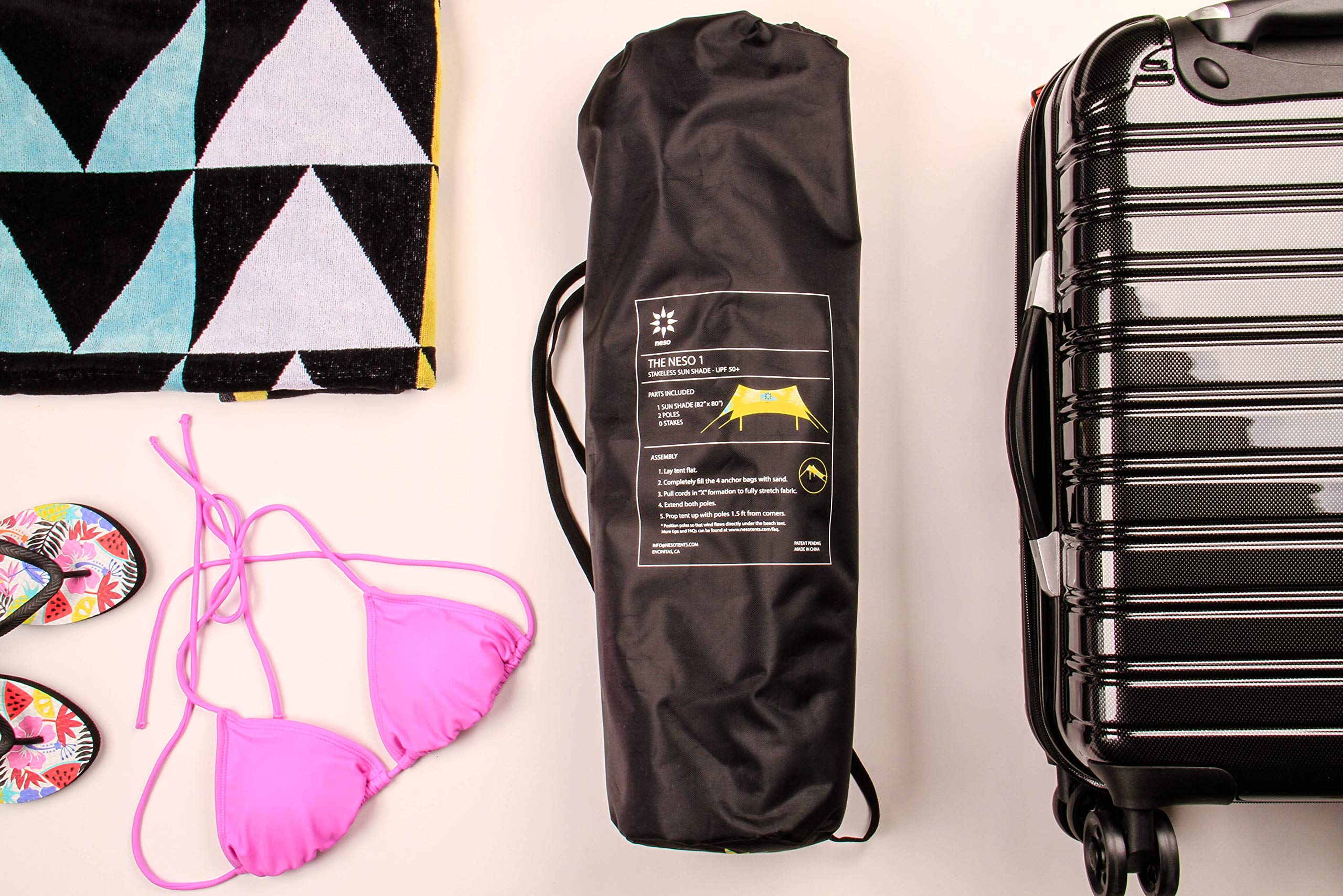 Neso next to beach blanket showing scale and family capacity benefit