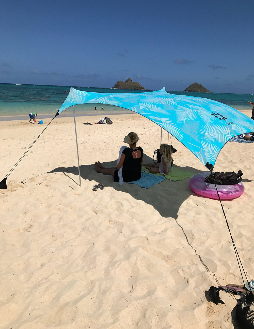 Neso size scale with beach chair indicating compact footprint
