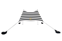 Neso tent anchor closeup showing sand-filled bag for stable wind resistance