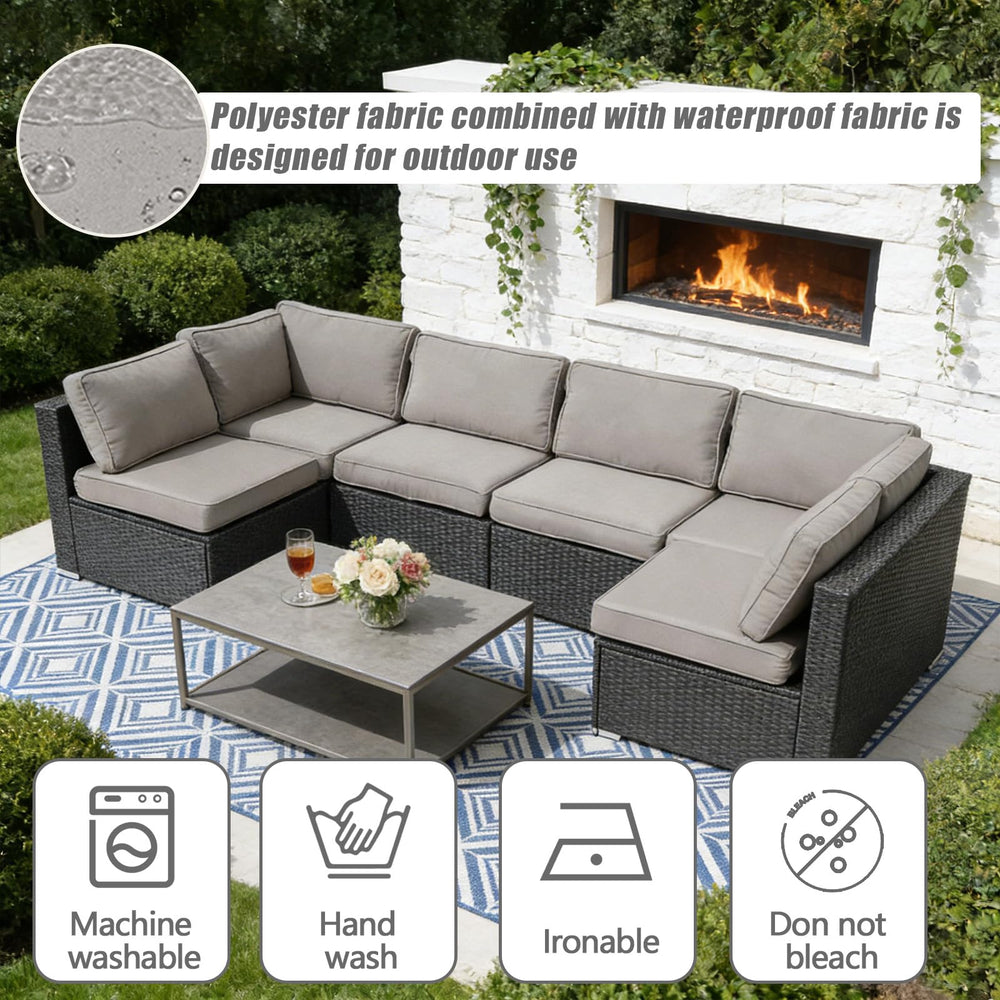 Nevsokio seat cover fitted on rattan sofa for a tidy, weather-ready look