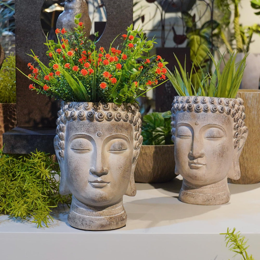 Newman House Studio Buddha planter on patio showing outdoor decor and peaceful ambience benefit