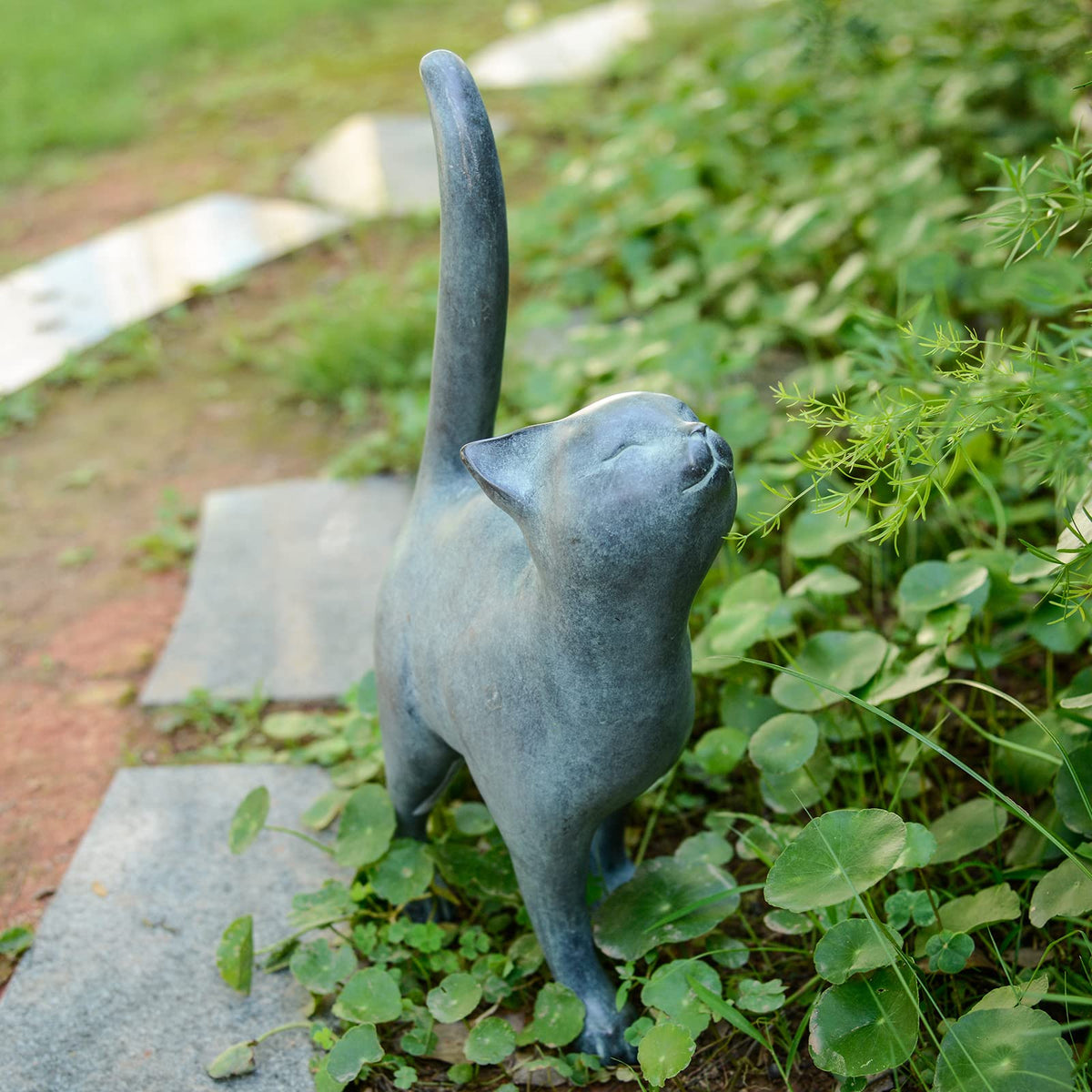 Newman House Studio front view of kitten statue showing welcoming pose and farmhouse charm