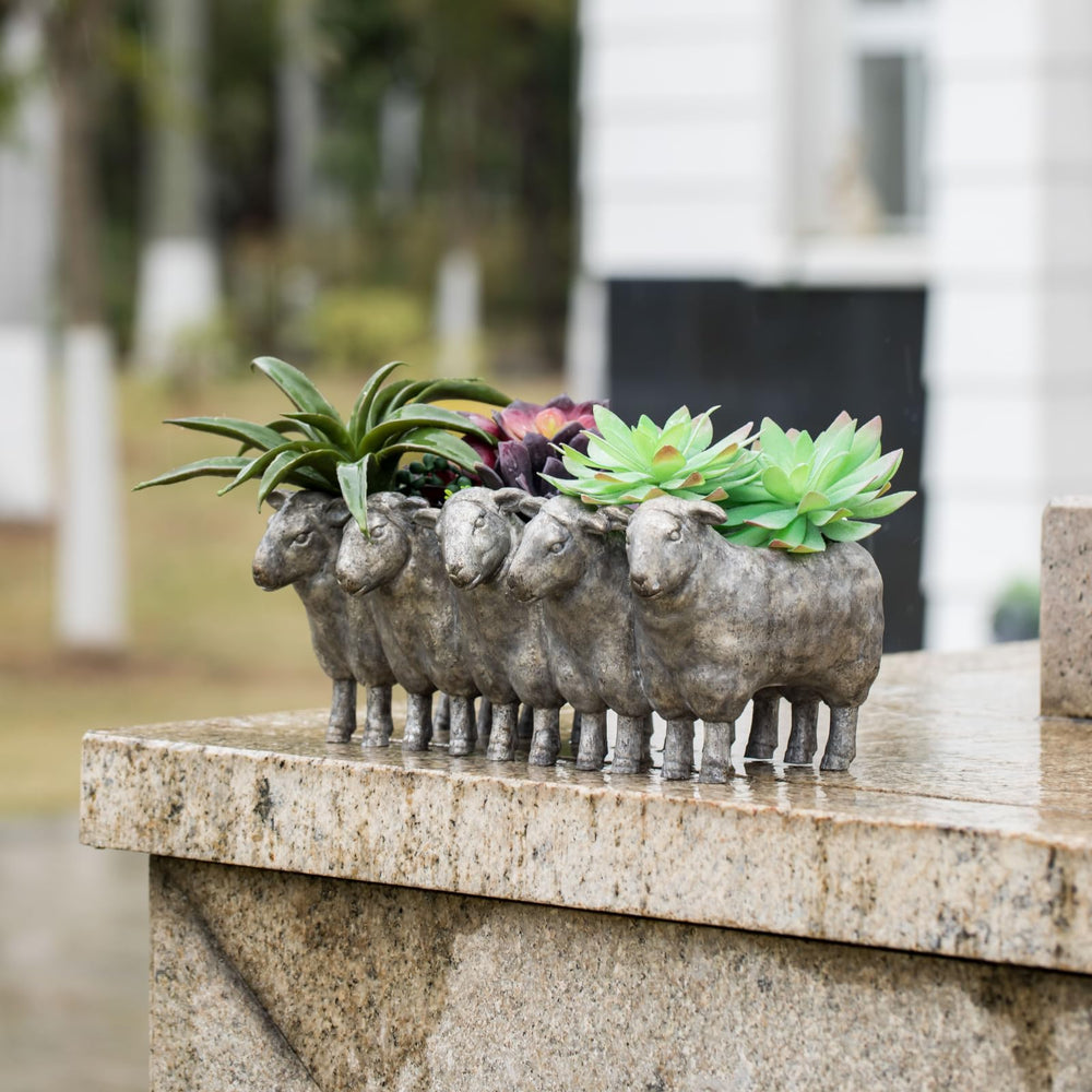 Newman House Studio sheep planter on windowsill with succulents showing space-saving benefit