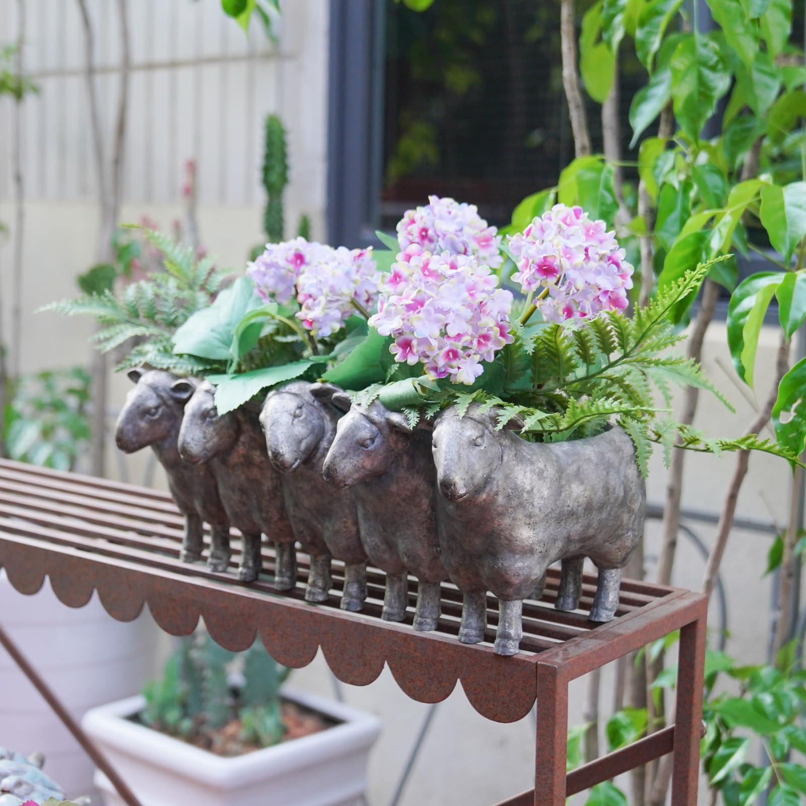 Newman House Studio sheep planter top view showing planting cavity and easy arrangement benefit