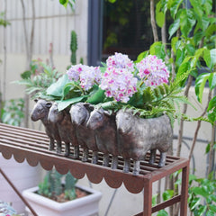 Newman House Studio sheep planter top view showing planting cavity and easy arrangement benefit