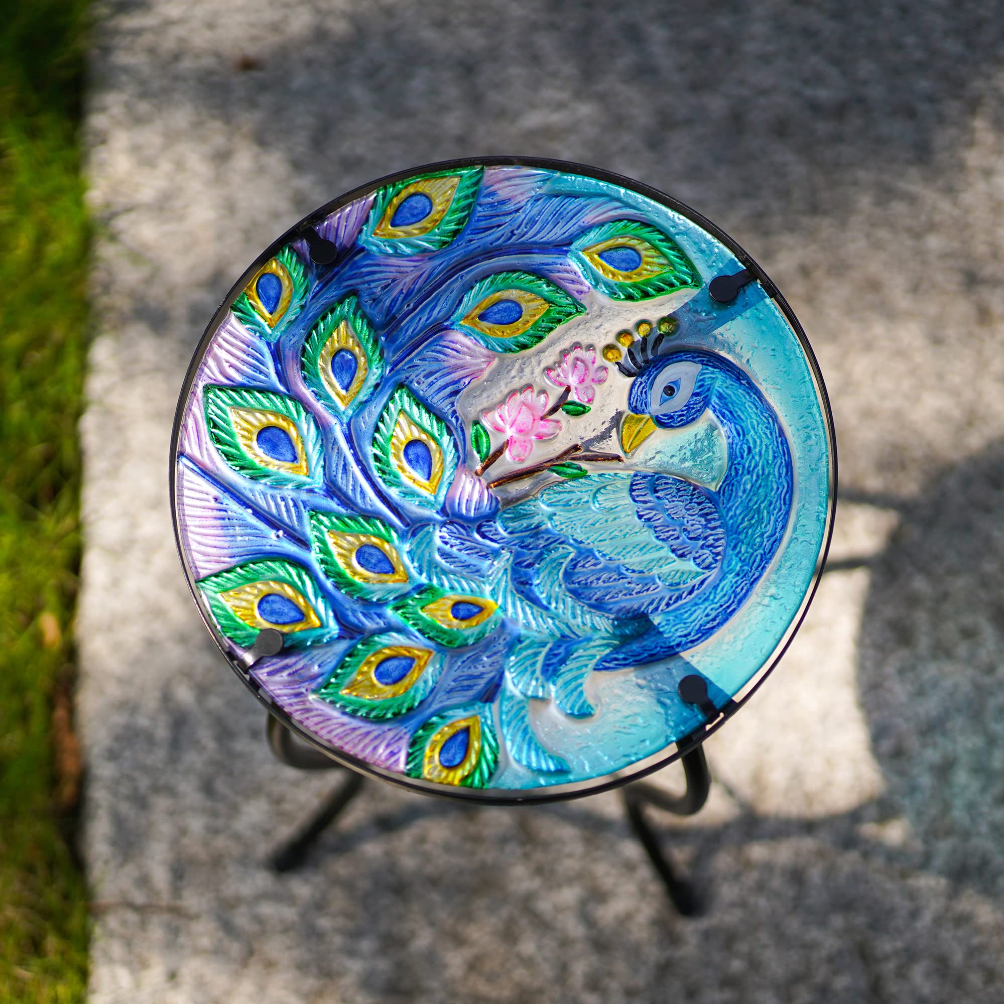 NewVees peacock next to chair for scale showing 10 inch top benefit: space-saving size